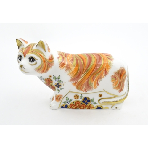 106 - A Royal Crown Derby paperweight modelled as a cat, Sugar Collectors Guild Cat. Marked under. Boxed. ... 