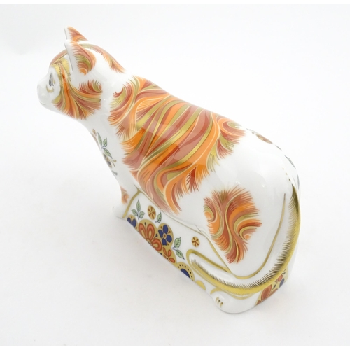 106 - A Royal Crown Derby paperweight modelled as a cat, Sugar Collectors Guild Cat. Marked under. Boxed. ... 