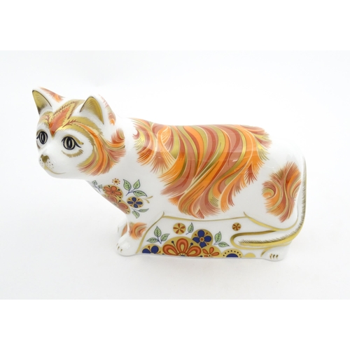 106 - A Royal Crown Derby paperweight modelled as a cat, Sugar Collectors Guild Cat. Marked under. Boxed. ... 