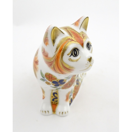 106 - A Royal Crown Derby paperweight modelled as a cat, Sugar Collectors Guild Cat. Marked under. Boxed. ... 