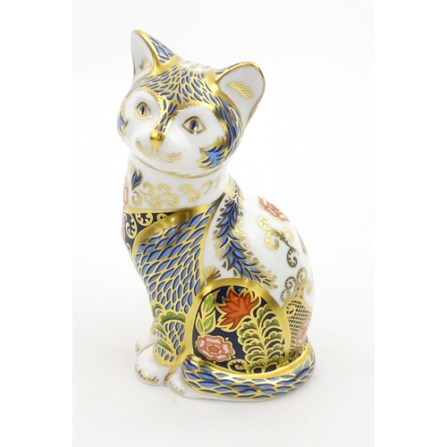 108 - A Royal Crown Derby paperweight modelled as a seated cat, Fireside Cat. Marked under, limited editio... 