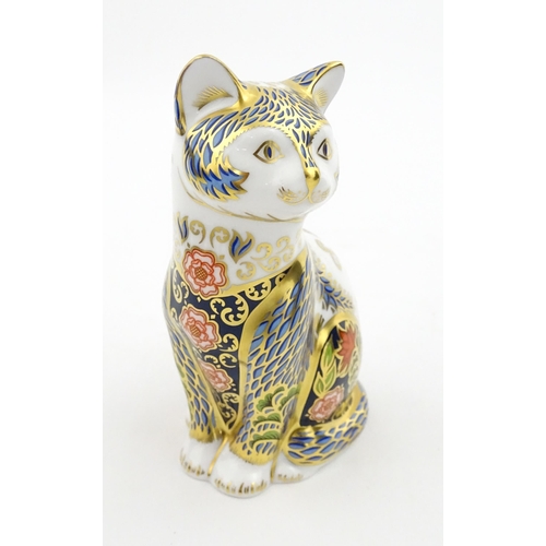 108 - A Royal Crown Derby paperweight modelled as a seated cat, Fireside Cat. Marked under, limited editio... 