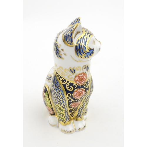 108 - A Royal Crown Derby paperweight modelled as a seated cat, Fireside Cat. Marked under, limited editio... 