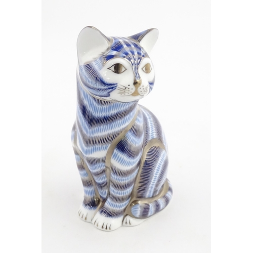 109 - A Royal Crown Derby paperweight modelled as a seated cat, Silver tabby Cat. Marked under. Boxed. App... 