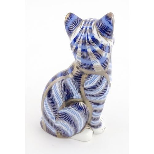 109 - A Royal Crown Derby paperweight modelled as a seated cat, Silver tabby Cat. Marked under. Boxed. App... 