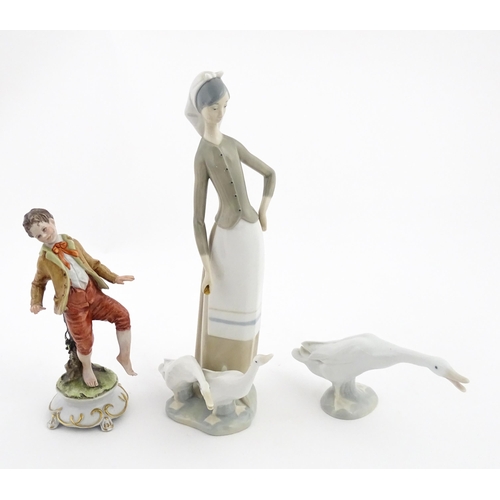 77 - A Lladro figure Girl with Geese, and a Lladro model of a goose. Together with a Capodimonte model of... 