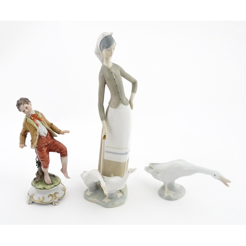 77 - A Lladro figure Girl with Geese, and a Lladro model of a goose. Together with a Capodimonte model of... 