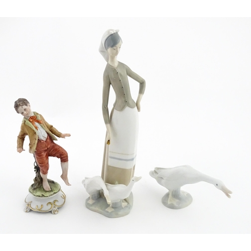 77 - A Lladro figure Girl with Geese, and a Lladro model of a goose. Together with a Capodimonte model of... 