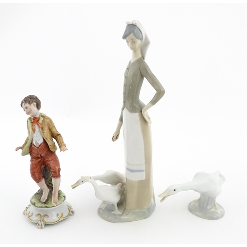 77 - A Lladro figure Girl with Geese, and a Lladro model of a goose. Together with a Capodimonte model of... 