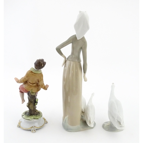 77 - A Lladro figure Girl with Geese, and a Lladro model of a goose. Together with a Capodimonte model of... 