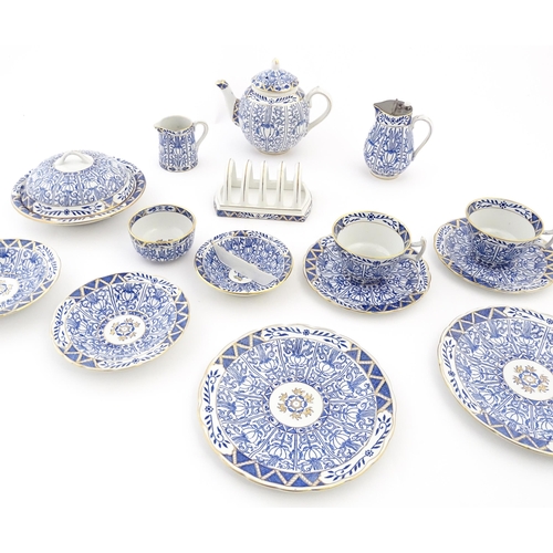 163 - A Harley Jones breakfast set for two in the Wilton Lily pattern comprising teapot, jug, sugar bowl, ... 