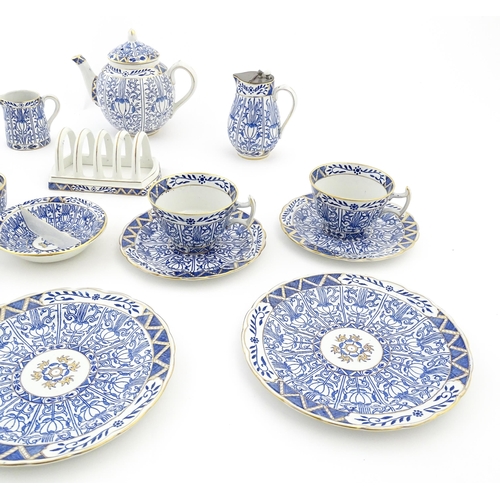 163 - A Harley Jones breakfast set for two in the Wilton Lily pattern comprising teapot, jug, sugar bowl, ... 