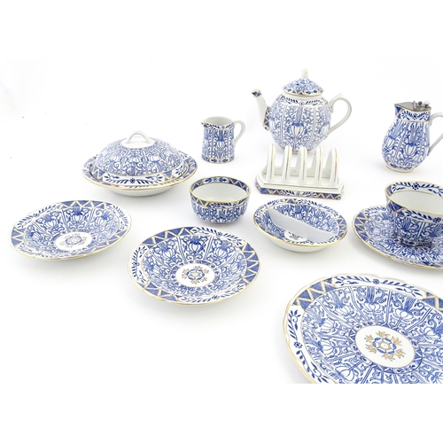 163 - A Harley Jones breakfast set for two in the Wilton Lily pattern comprising teapot, jug, sugar bowl, ... 