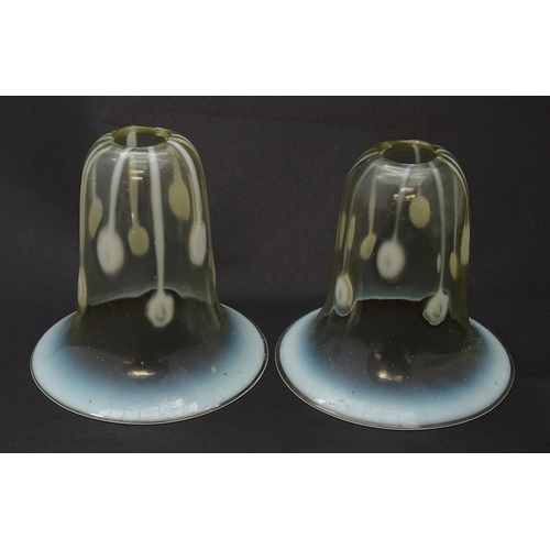 181 - A pair of Art Nouveau vaseline glass light shades. Approx 5 1/2