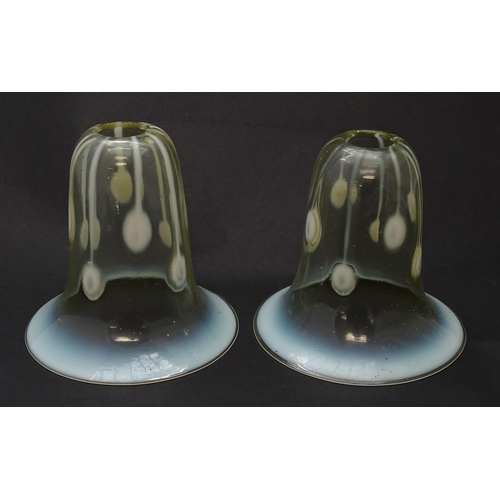 181 - A pair of Art Nouveau vaseline glass light shades. Approx 5 1/2