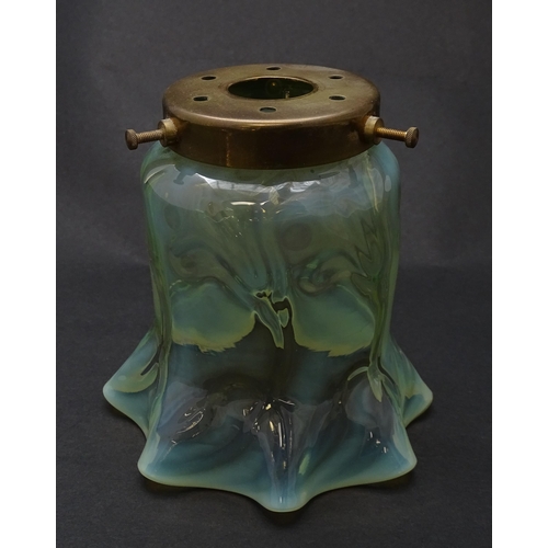 182 - An Art Nouveau vaseline glass light shade. Approx 5