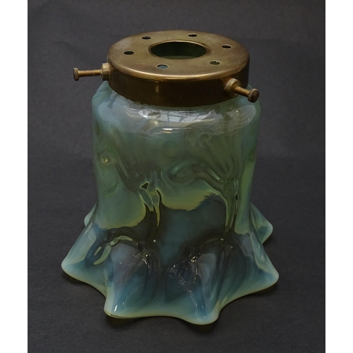 182 - An Art Nouveau vaseline glass light shade. Approx 5