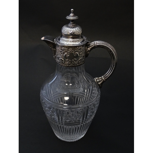 183 - A Victorian cut glass claret jug with silver mounts hallmarked Birmingham 1894 maker J Sherwood & So... 