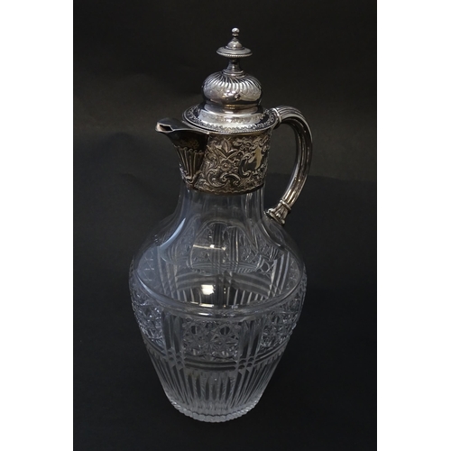 183 - A Victorian cut glass claret jug with silver mounts hallmarked Birmingham 1894 maker J Sherwood & So... 