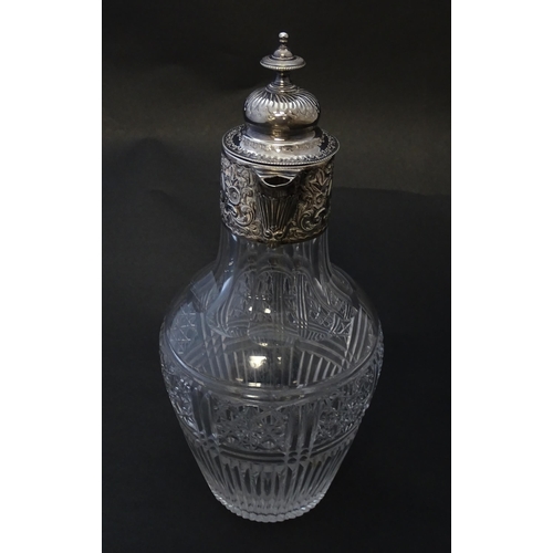 183 - A Victorian cut glass claret jug with silver mounts hallmarked Birmingham 1894 maker J Sherwood & So... 