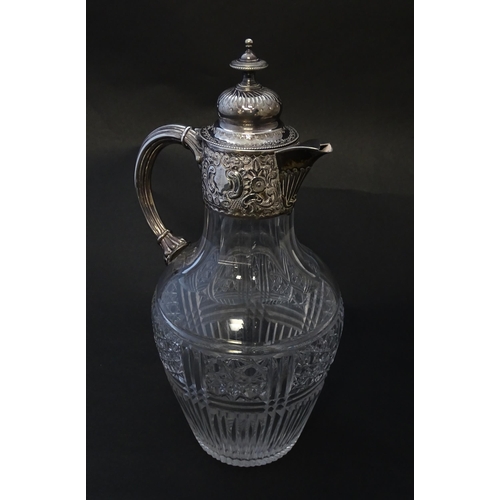 183 - A Victorian cut glass claret jug with silver mounts hallmarked Birmingham 1894 maker J Sherwood & So... 