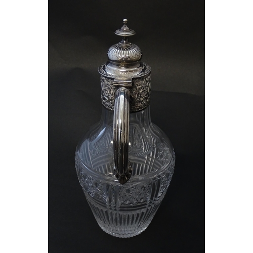 183 - A Victorian cut glass claret jug with silver mounts hallmarked Birmingham 1894 maker J Sherwood & So... 