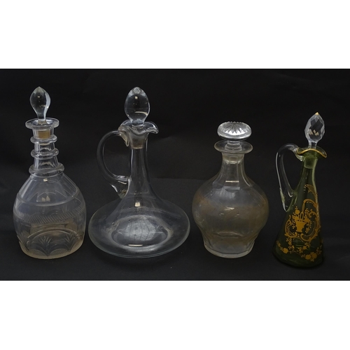 185 - Various 19thC and later glass decanters and ewers. The tallest approx 11