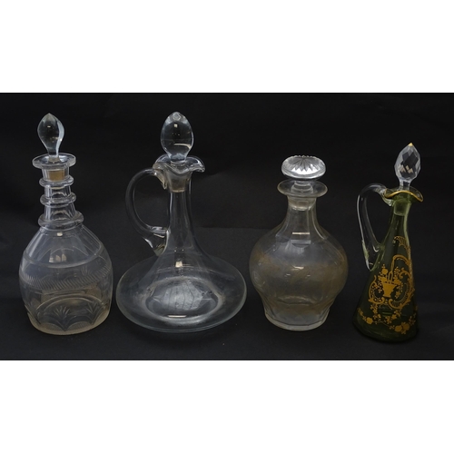 185 - Various 19thC and later glass decanters and ewers. The tallest approx 11