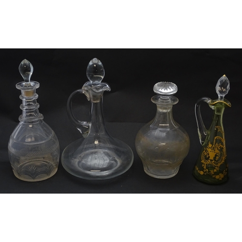 185 - Various 19thC and later glass decanters and ewers. The tallest approx 11