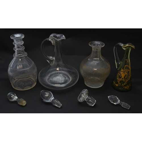 185 - Various 19thC and later glass decanters and ewers. The tallest approx 11