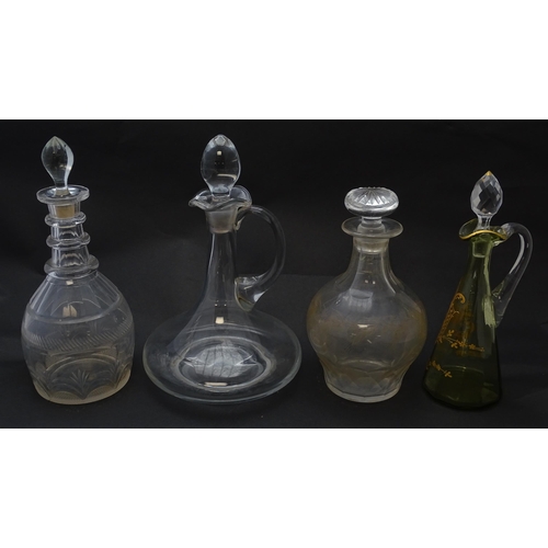 185 - Various 19thC and later glass decanters and ewers. The tallest approx 11