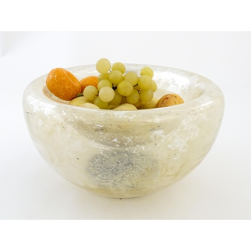 193 - A late 20thC Mercury glass style bowl together with a quantity of painted faux alabaster fruit. The ... 