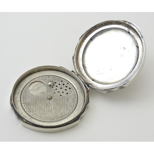 242 - A silver compact with engine turned decoration hallmarked Birmingham 1931, maker Adie Bros Ltd. Appr... 