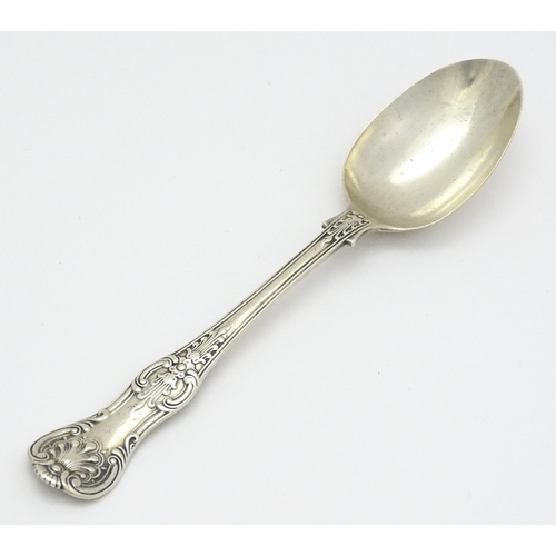 243 - A Victorian Queens pattern table spoon, hallmarked London 1876. maker Chawner & Co (George William A... 