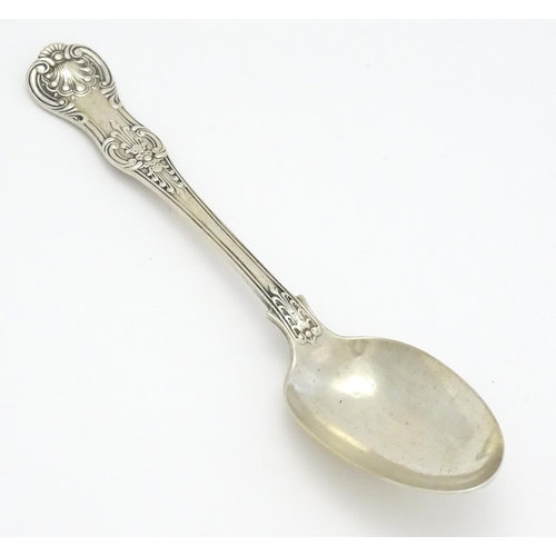 243 - A Victorian Queens pattern table spoon, hallmarked London 1876. maker Chawner & Co (George William A... 