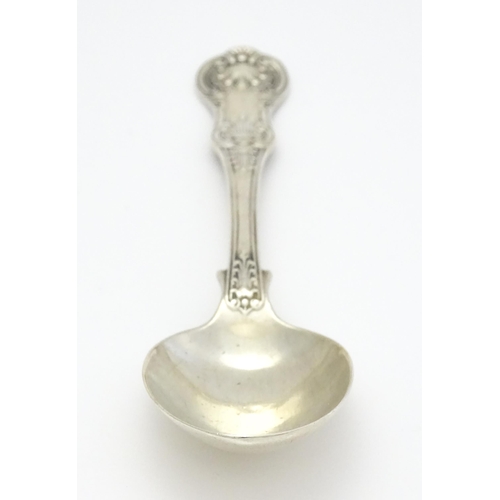 243 - A Victorian Queens pattern table spoon, hallmarked London 1876. maker Chawner & Co (George William A... 