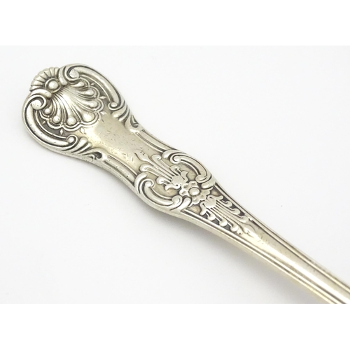 243 - A Victorian Queens pattern table spoon, hallmarked London 1876. maker Chawner & Co (George William A... 