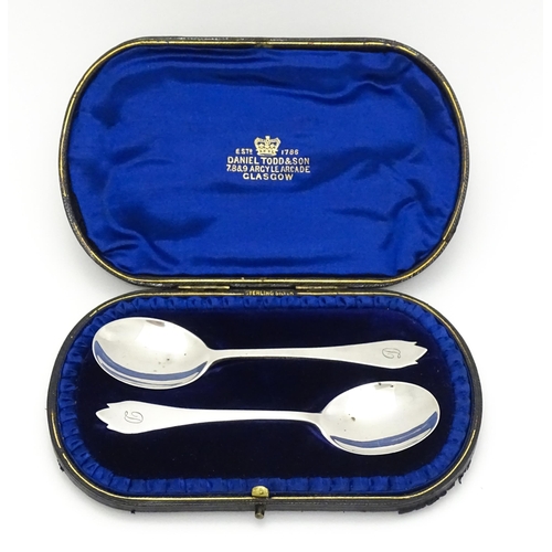 369 - A cased pair of silver preserve spoons hallmarked London 1904, maker Josiah Williams & Co. Approx. 5... 