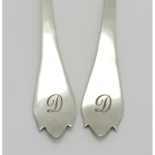 369 - A cased pair of silver preserve spoons hallmarked London 1904, maker Josiah Williams & Co. Approx. 5... 