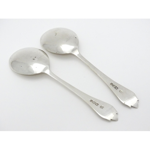 369 - A cased pair of silver preserve spoons hallmarked London 1904, maker Josiah Williams & Co. Approx. 5... 