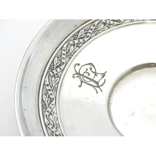 406 - A French silver cup and saucer with banded decoration, maker Gustave Veyrat. Cup approx. 2 1/2