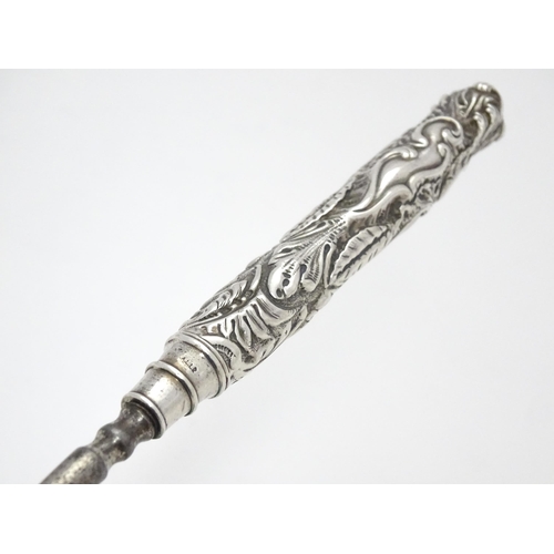 418 - A Victorian silver handled bread fork with embossed decoration, hallmarked Birmingham 1892, maker Ad... 