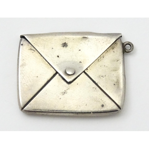 302 - A Silver stamp case of envelope form. Hallmarked Birmingham 1901 maker Gourdel Vales & Co. Approx 1 ... 