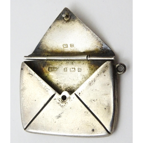 302 - A Silver stamp case of envelope form. Hallmarked Birmingham 1901 maker Gourdel Vales & Co. Approx 1 ... 