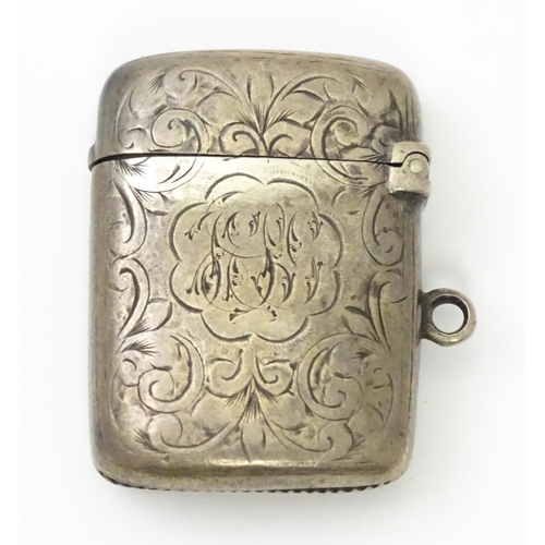 332 - A Victorian silver vesta case with engraved decoration. Hallmarked Birmingham 1897 maker Colen Hewer... 