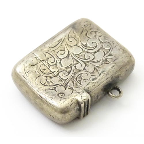 332 - A Victorian silver vesta case with engraved decoration. Hallmarked Birmingham 1897 maker Colen Hewer... 