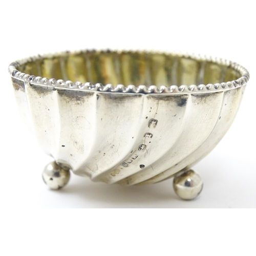 422 - A Victorian silver salt of circular fluted form hallmarked Birmingham 1891, maker Minshull & Latimer... 