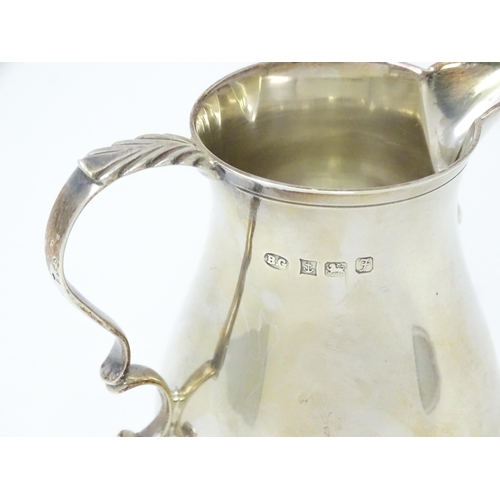 273 - A 20thC silver cream jug hallmarked Birmingham 1980 maker Bert Gordon. Approx 3 3/4