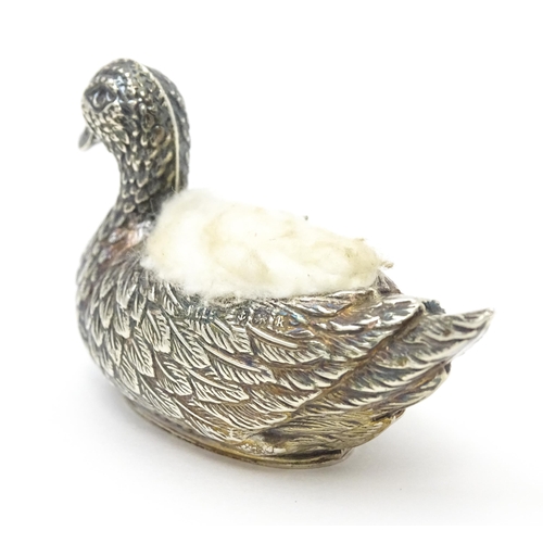 281 - A silver novelty pin cushion in the form of a duck. Hallmarked Birmingham 1909 maker Adie & Lovekin ... 