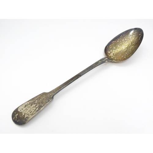 289 - A George IV silver basting / stuffing spoon. Hallmarked London 1823 maker Clement Cheese. Approx 11 ... 